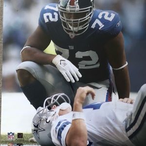 New York football giants Osi sacks Romo. One of the best pics in giants history